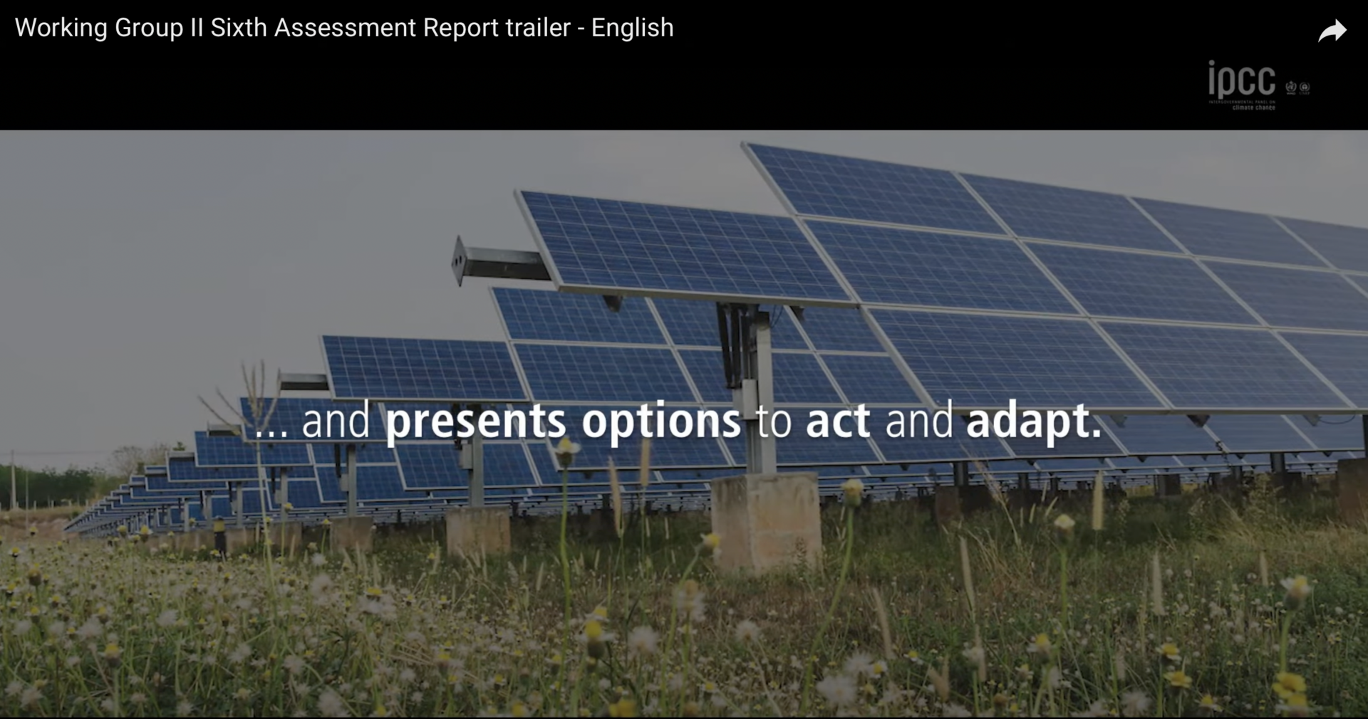 Screengrab of IPCC assessment video trailer with solar panels in background.