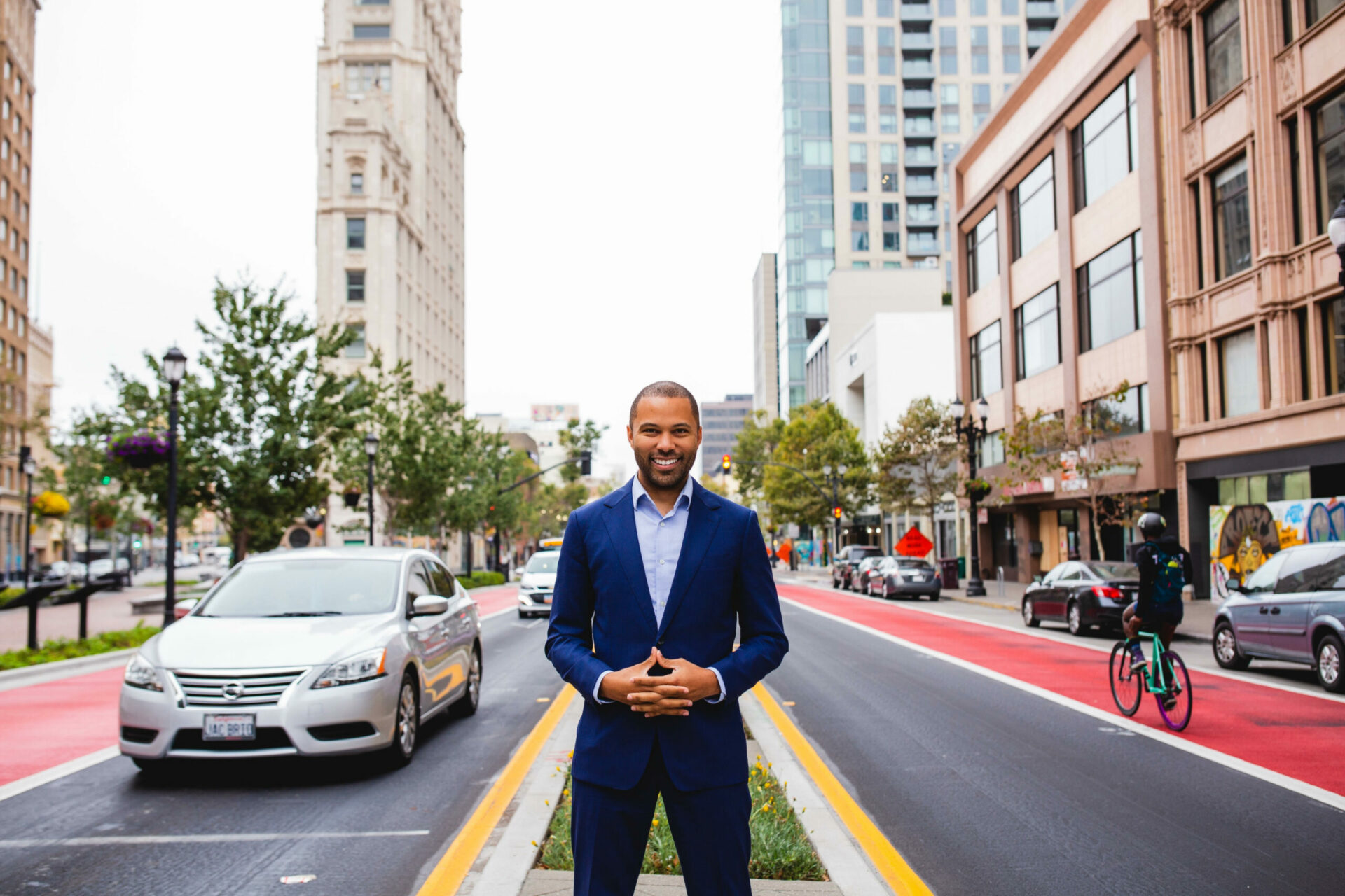 Warren Logan standing in downtown Oakland. Photo courtesy City of Oakland.