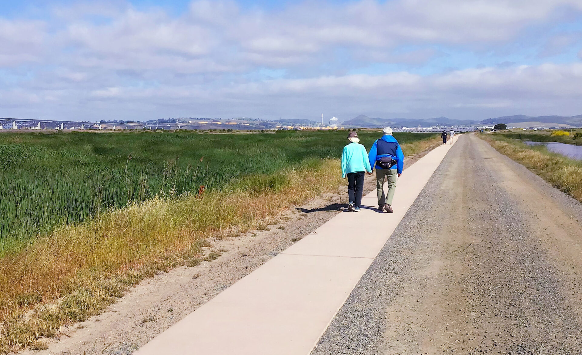 Two people strolling along the trail.