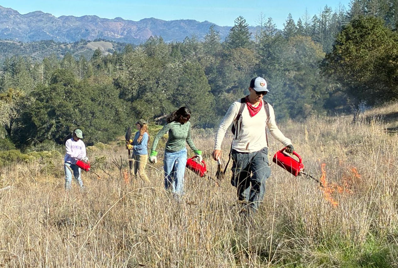 Crealock and McCarthy at a local stable near Fairfax, where beloved horses remain at risk in a fast-moving fire. 