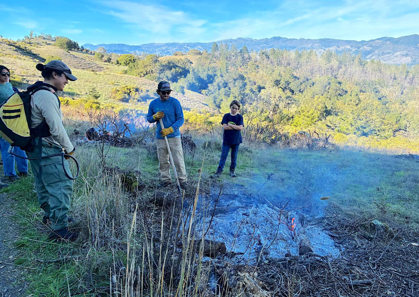 Crealock and McCarthy at a local stable near Fairfax, where beloved horses remain at risk in a fast-moving fire. 