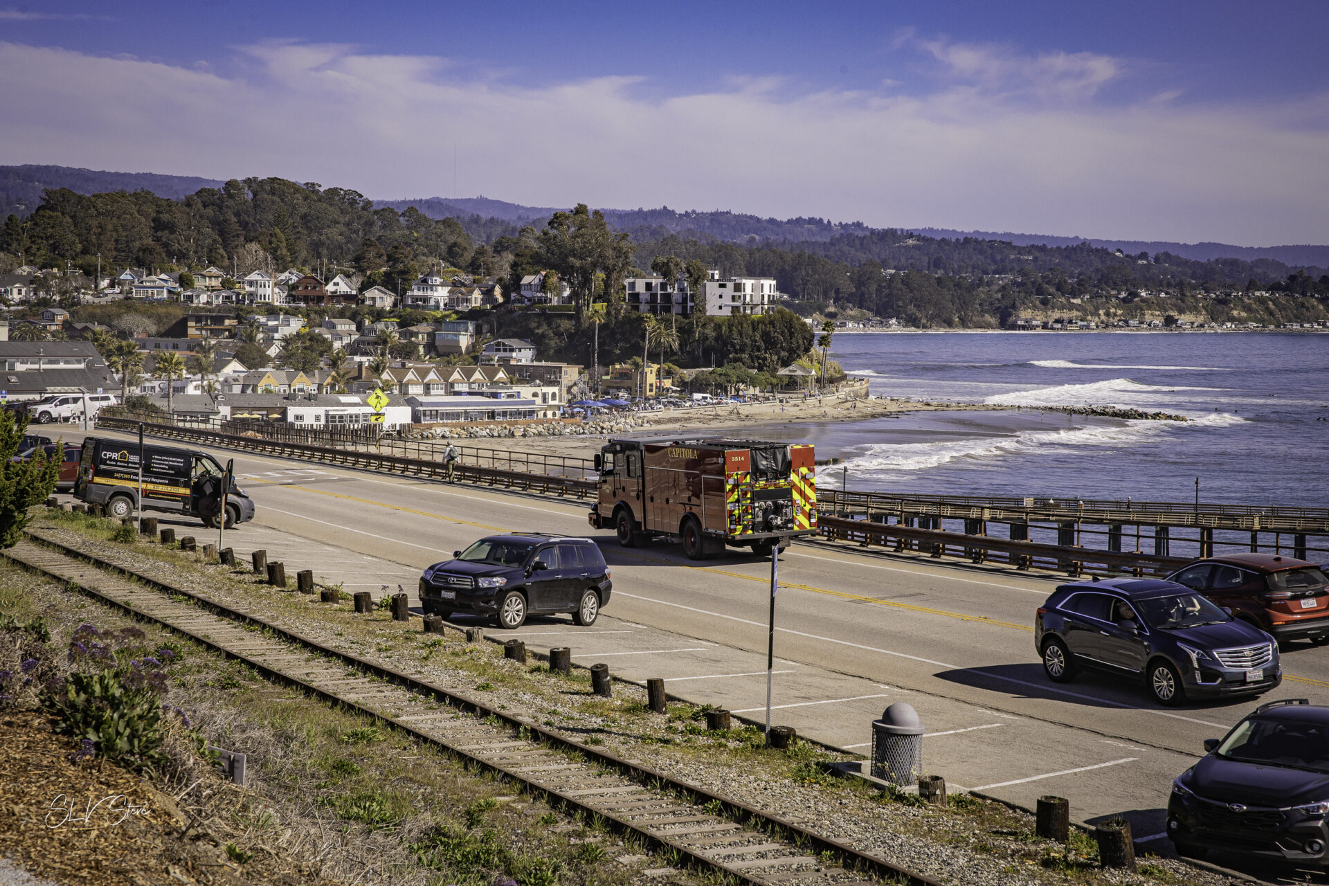 Fire truck driving on Santa Cruz coastline.